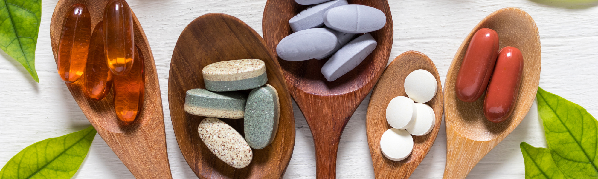 a spoonful of colorful capsules